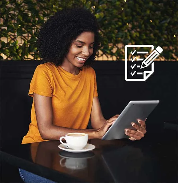 Woman working on a tablet.