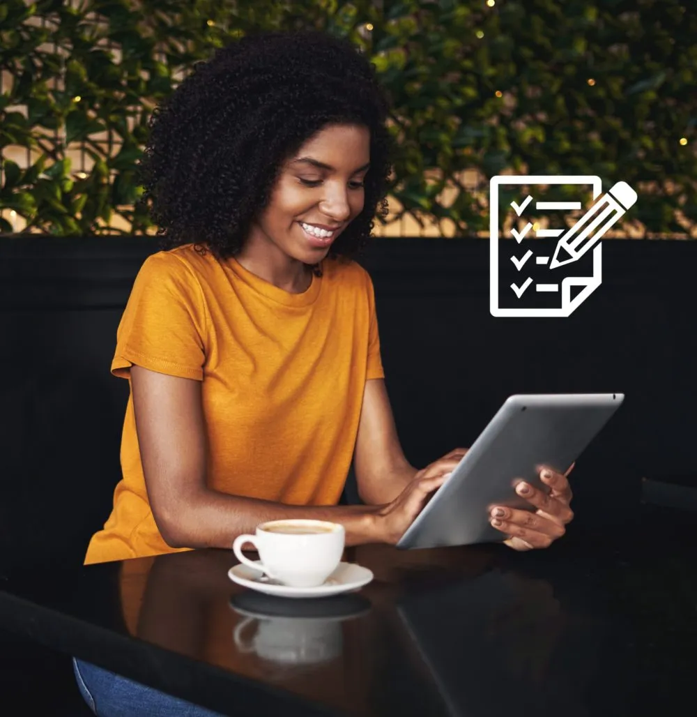 Woman working on a tablet.