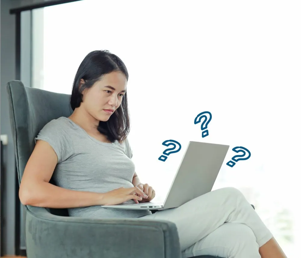 Woman working on her laptop.